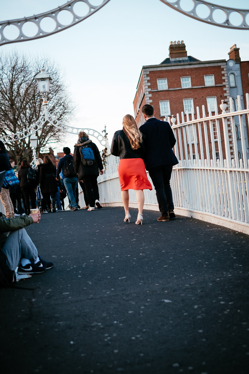 engaged couple on the ha'penny bridge dublin