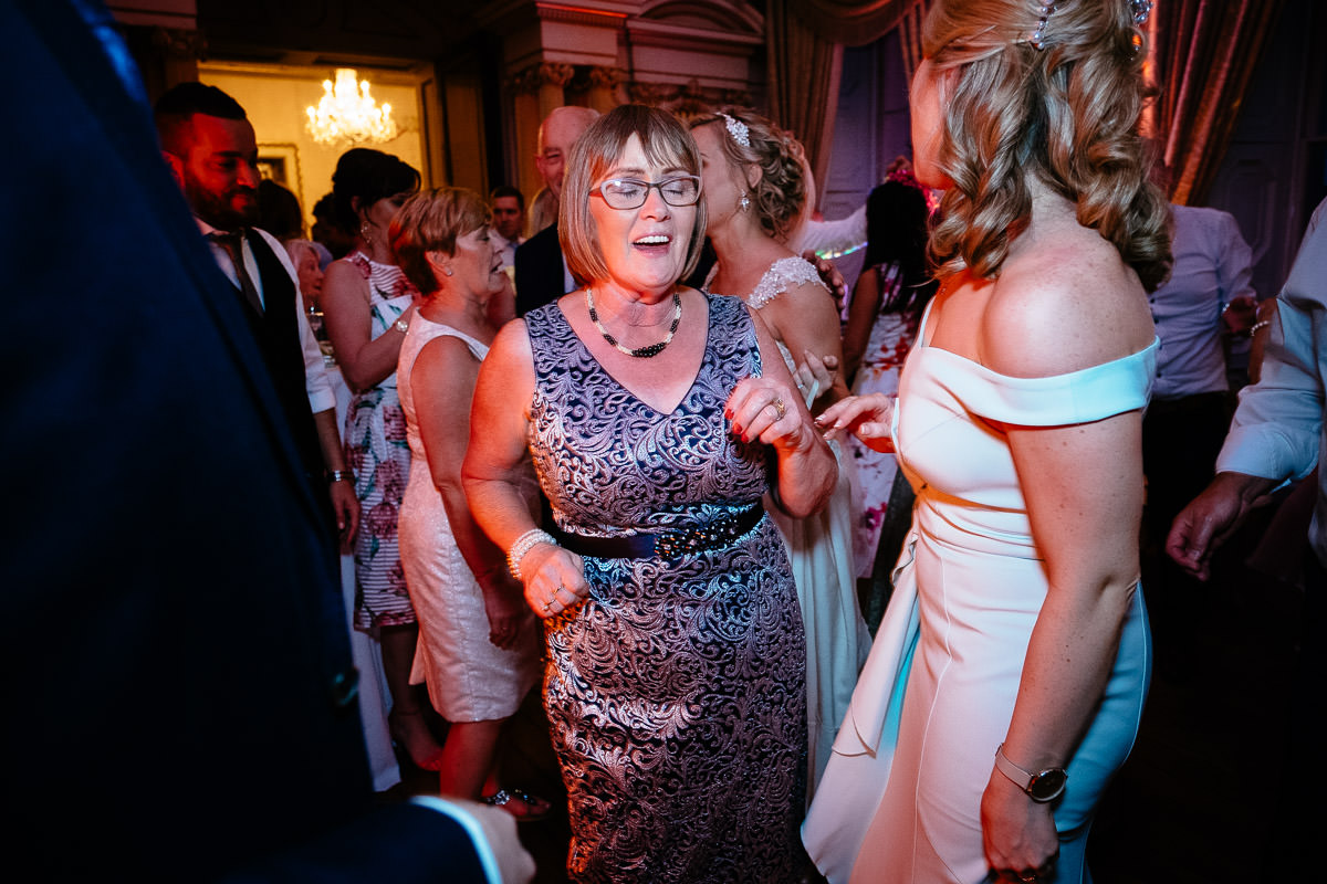 Guests dance together during the reception at Carton House.