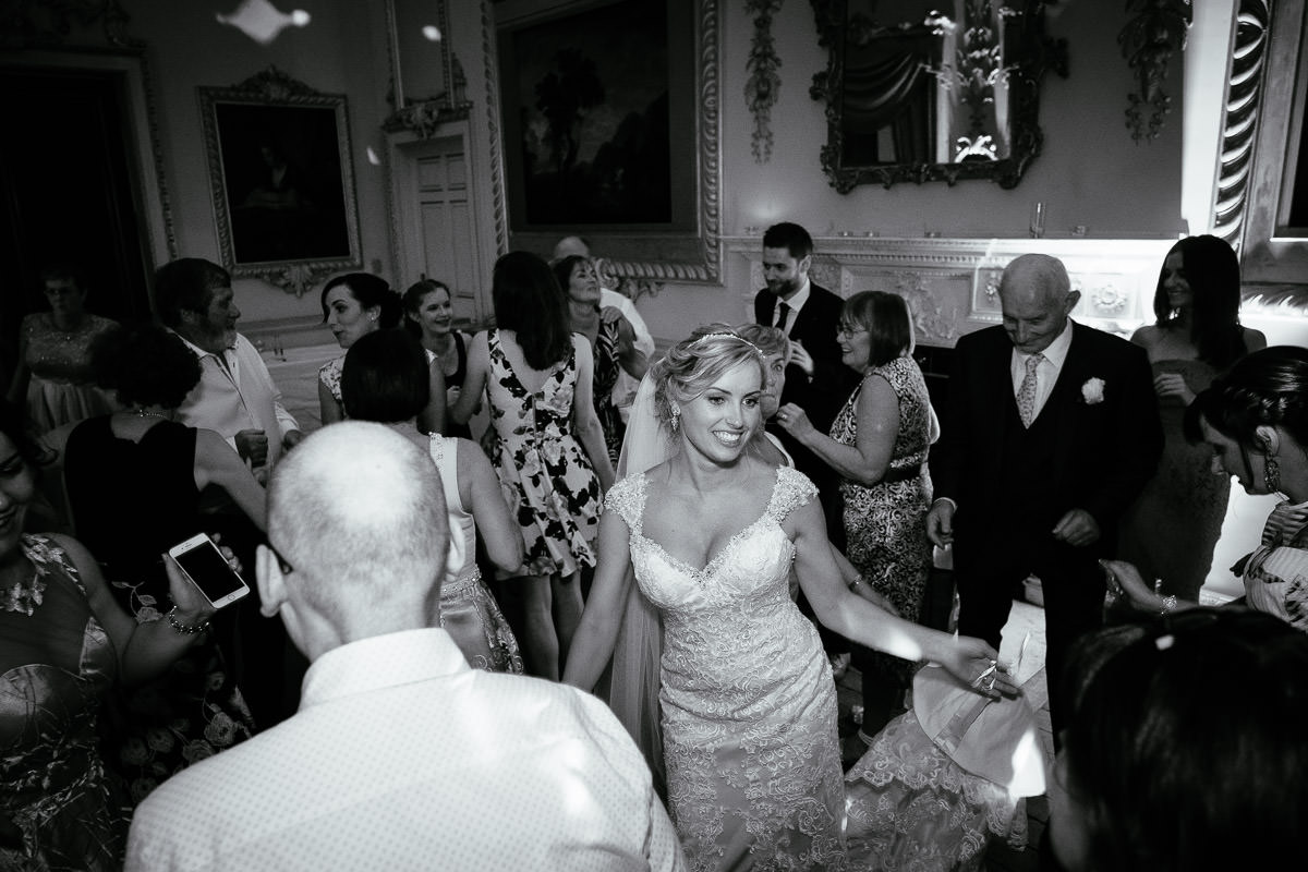 The bride dances surrounded by guests during the reception at Carton House.