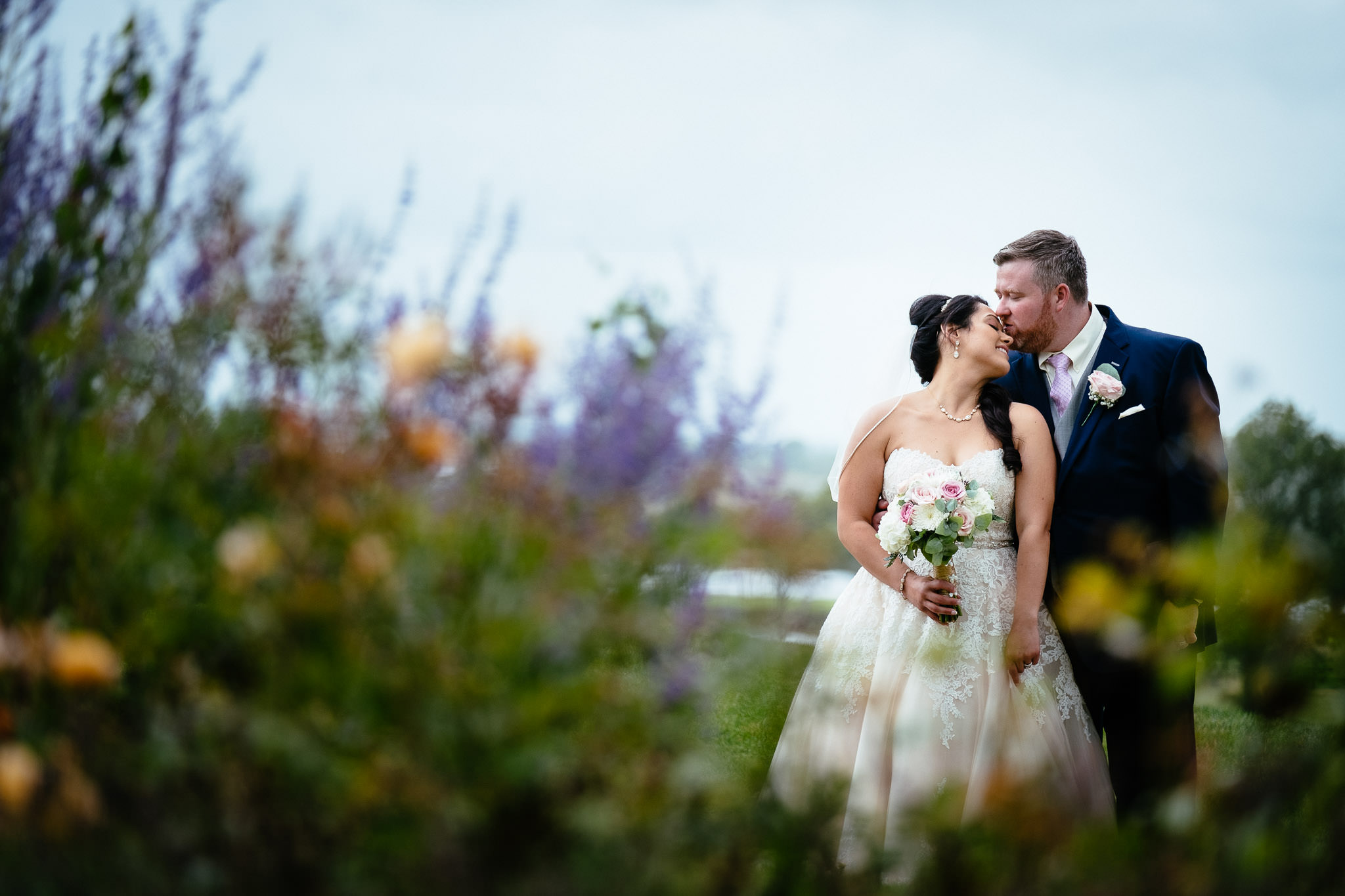 bride and groom kissing at their Wedding at Glenlo Abbey Galway