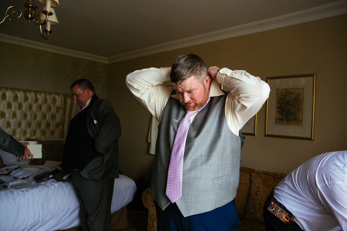 groom preparations at glenlo abbey hotel wedding
