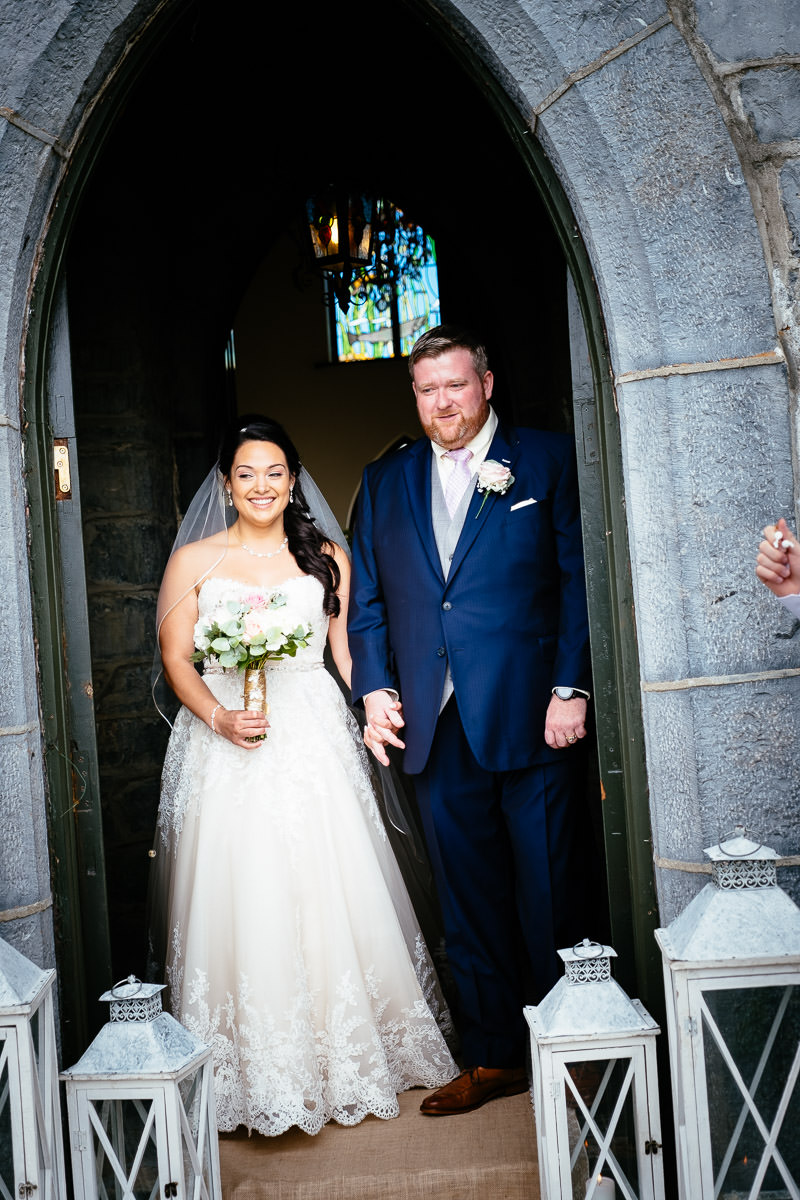 bride and groom embracing at gleno abbey hotel wedding