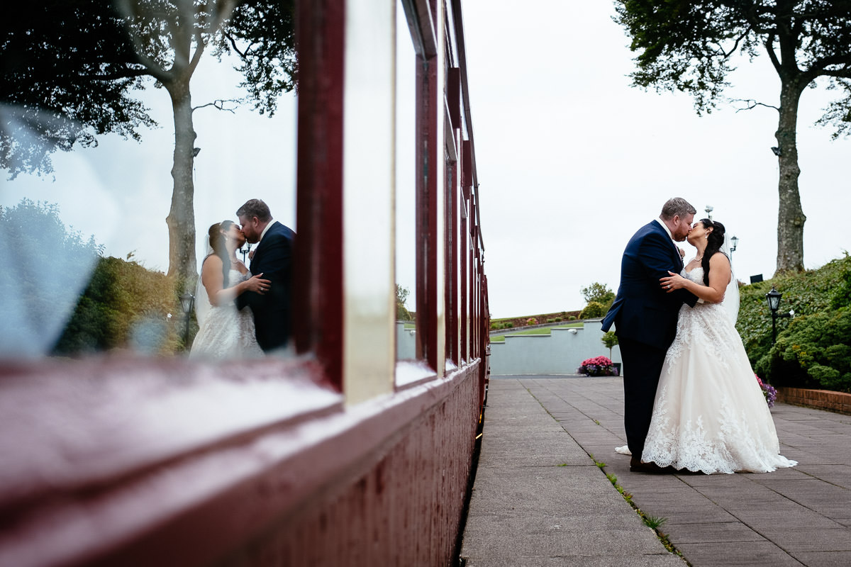 bride and groom kissing at glenlo abbey hotel wedding