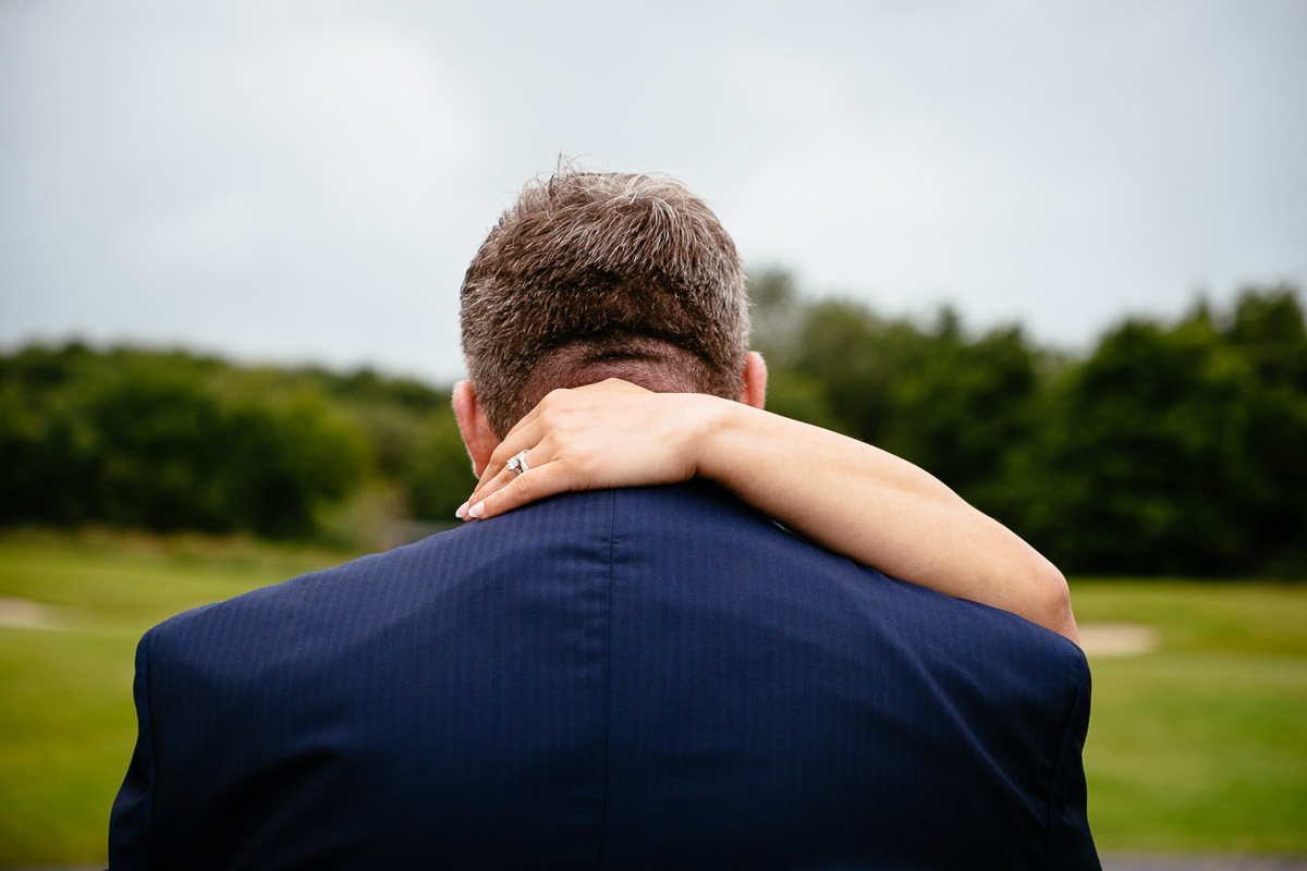 bride and groom embracing at gleno abbey hotel wedding