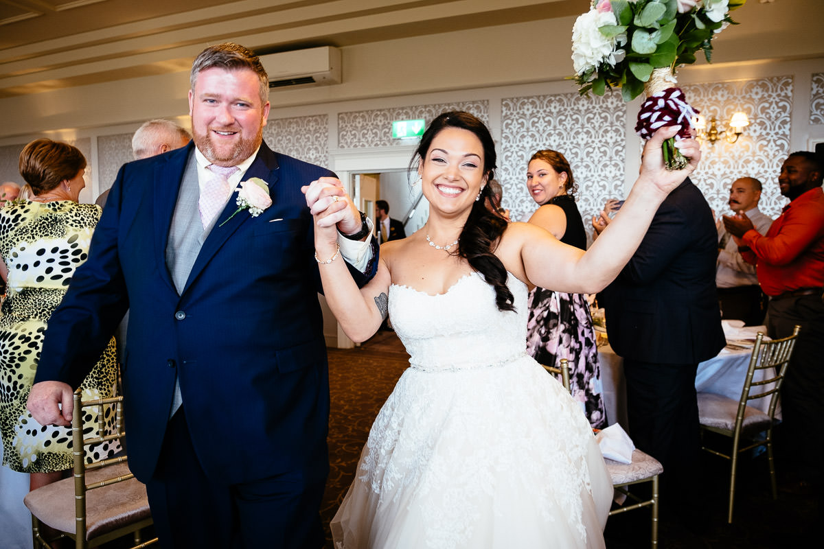 bride and groom entering function room at gleno abbey hotel wedding