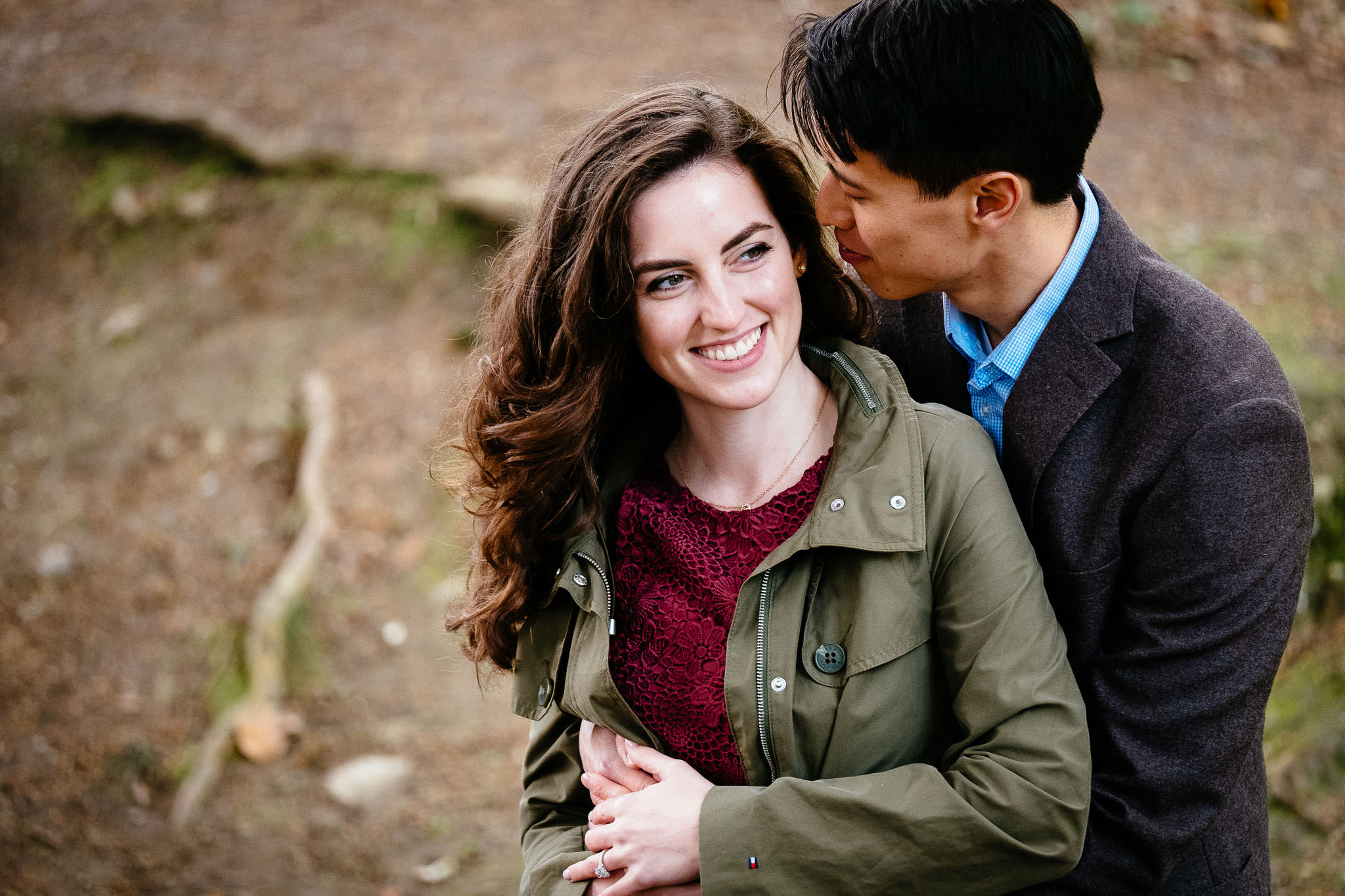 engaged couple laughing in st annes park