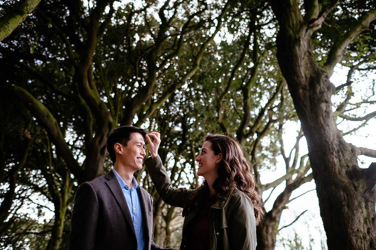 engaged couple interacting in dublin park