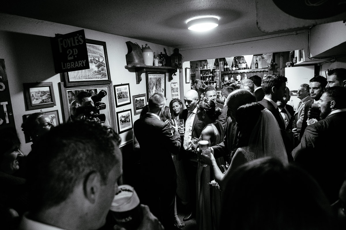 wedding guests at irish country pub