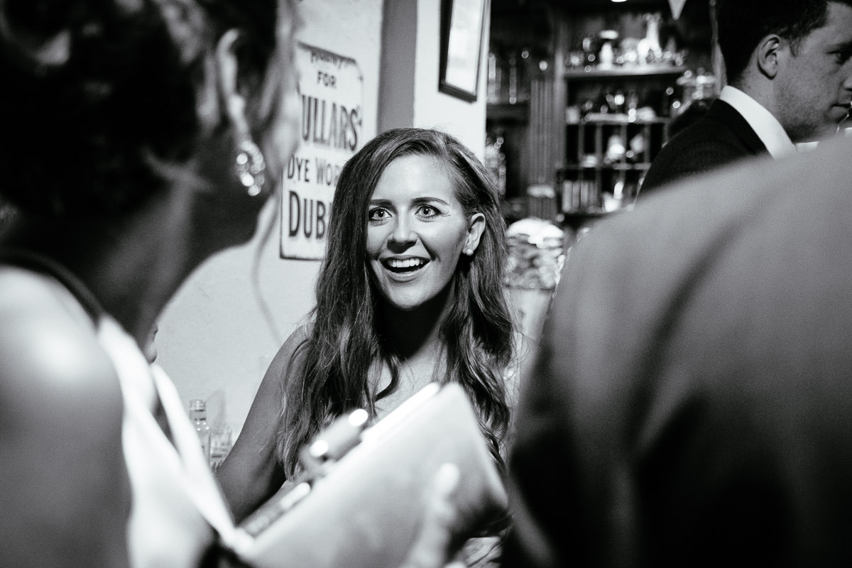wedding guests at irish country pub