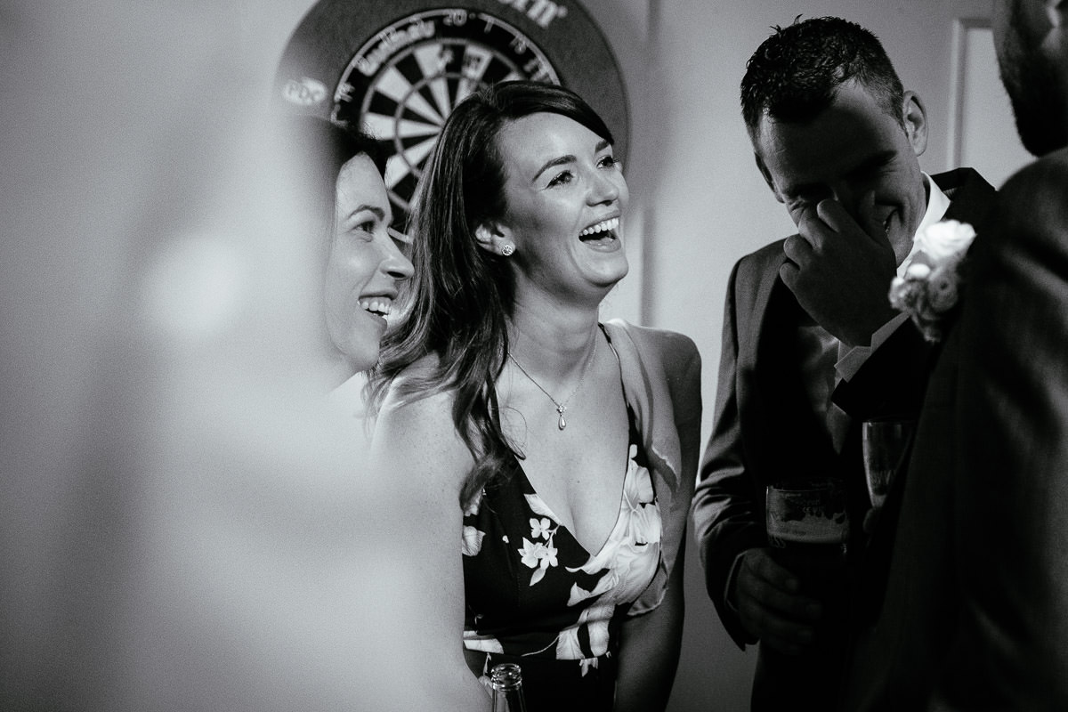 wedding guests at irish country pub