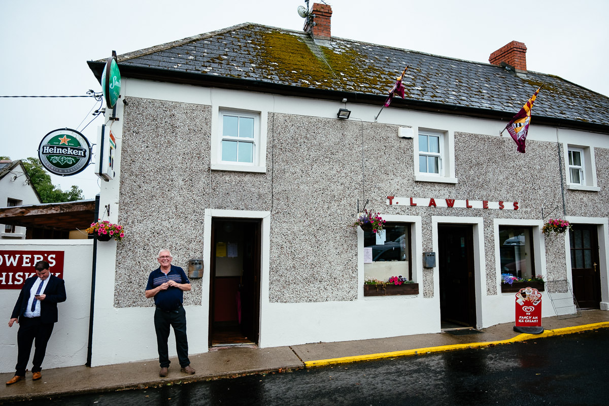 wedding guests at irish country pub