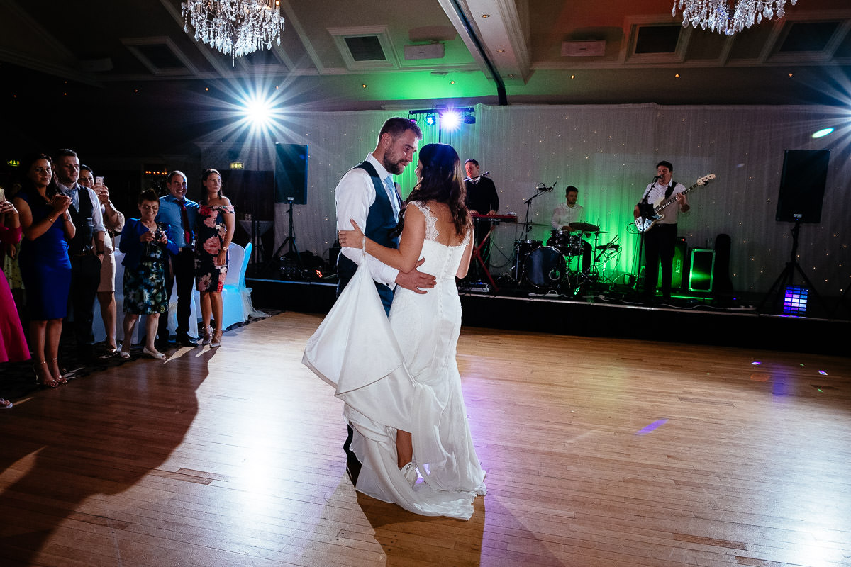 bride and groom dancing