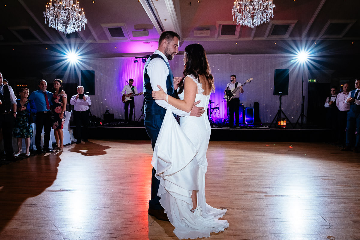bride and groom dancing