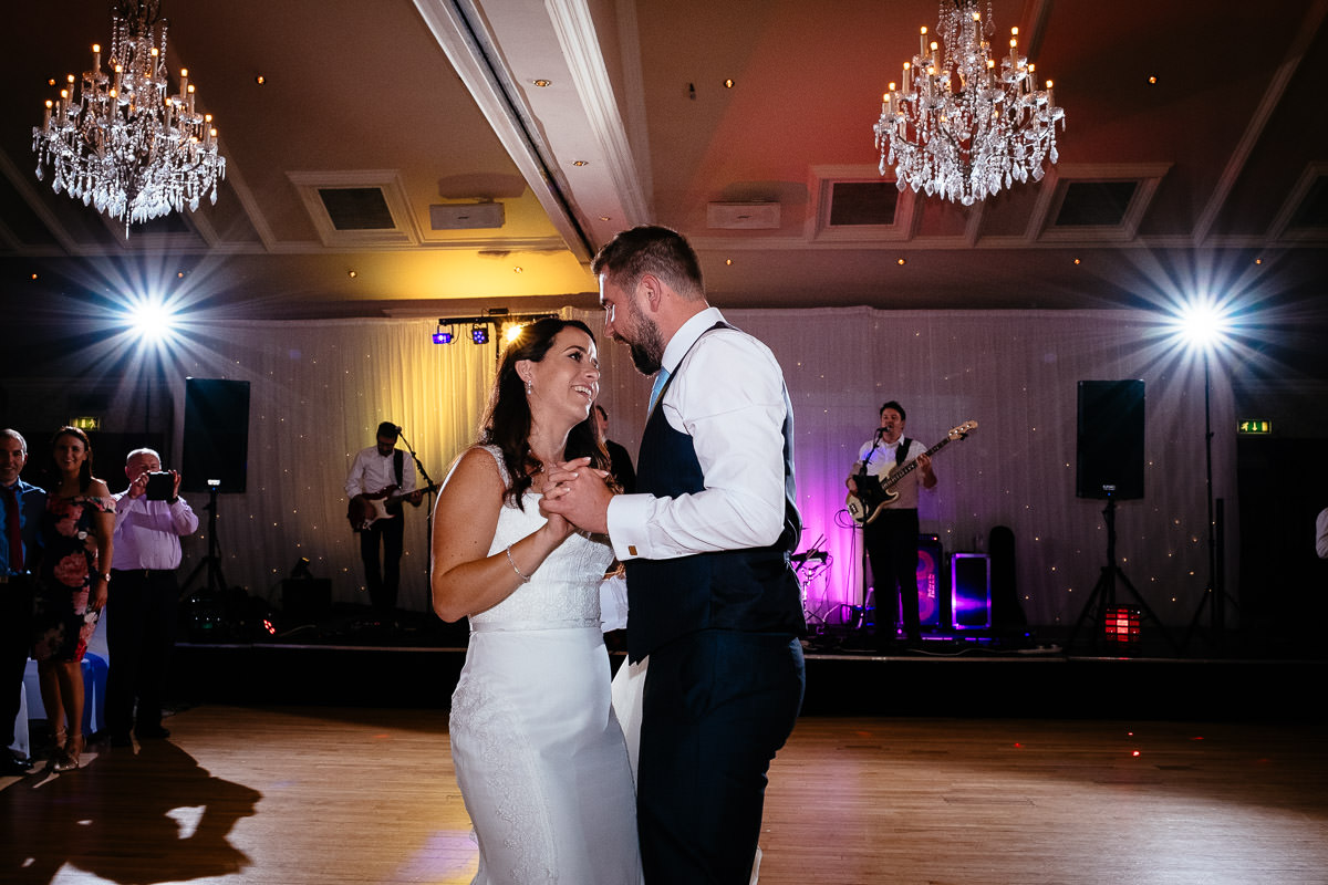 bride and groom dancing