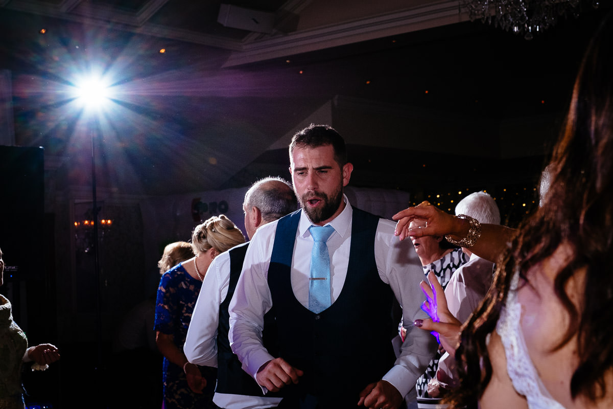 bride and groom dancing