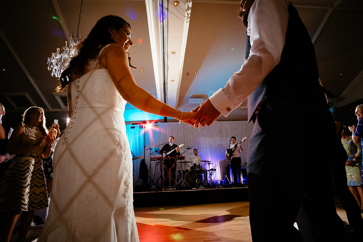 bride and groom dancing