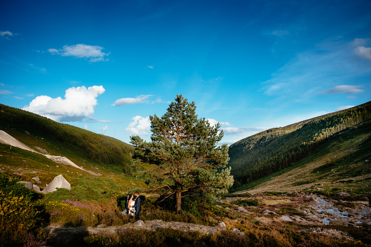 bride and groom at sunset in the wicklow mountains
