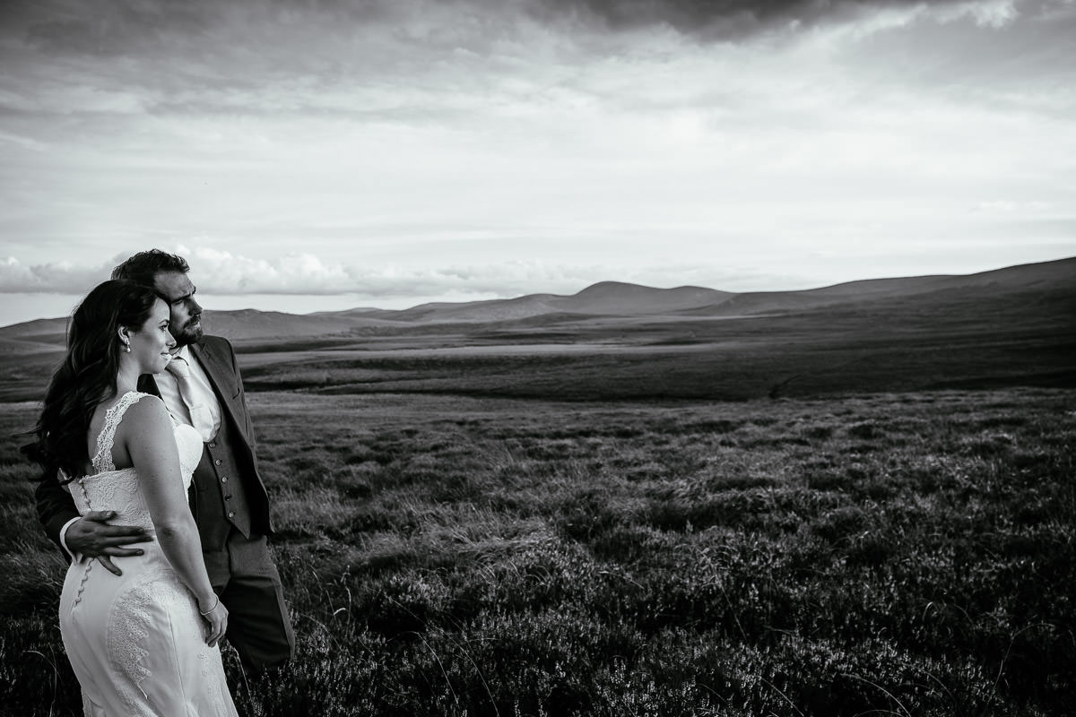 bride and groom at sunset in the wicklow mountains