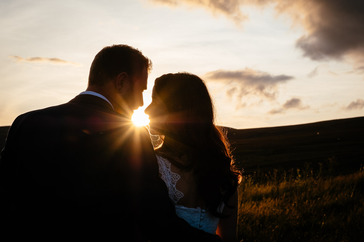 bride and groom at sunset in the wicklow mountains
