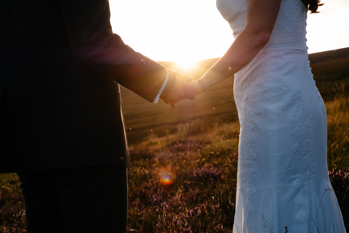 bride and groom at sunset in the wicklow mountains