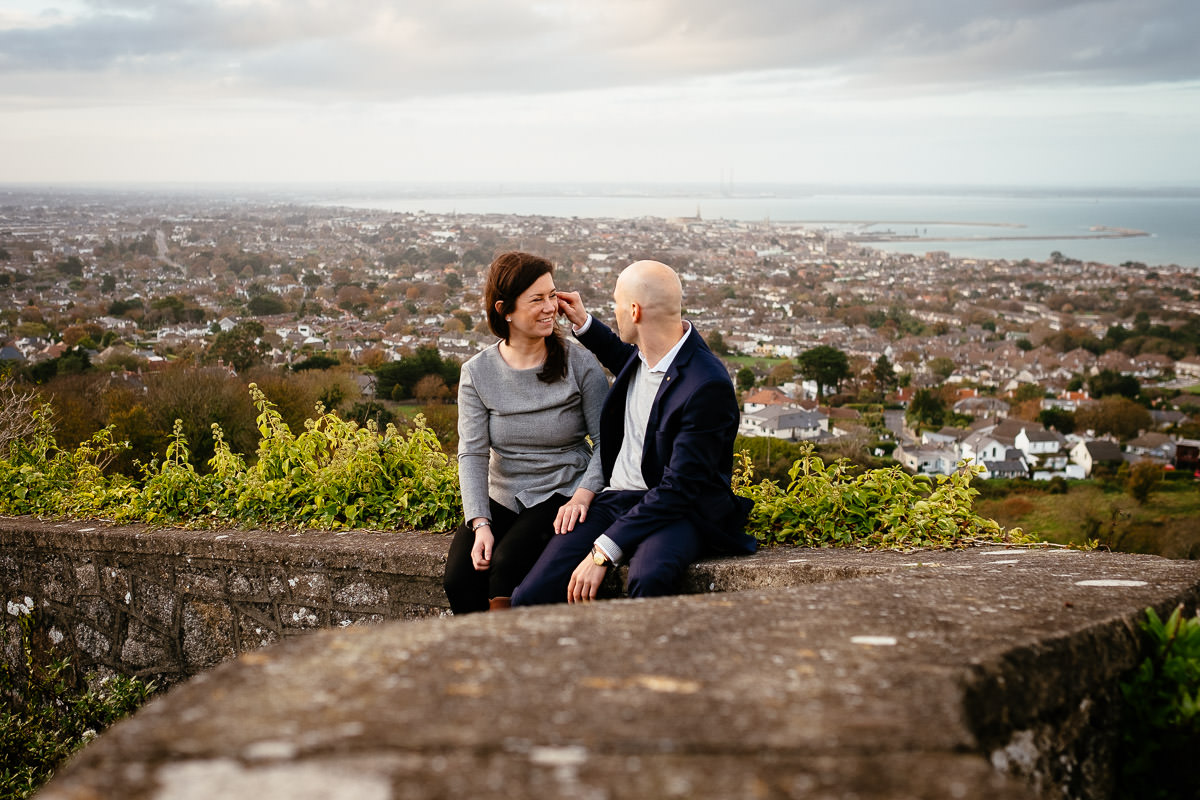 engaged couple overlooking dublin