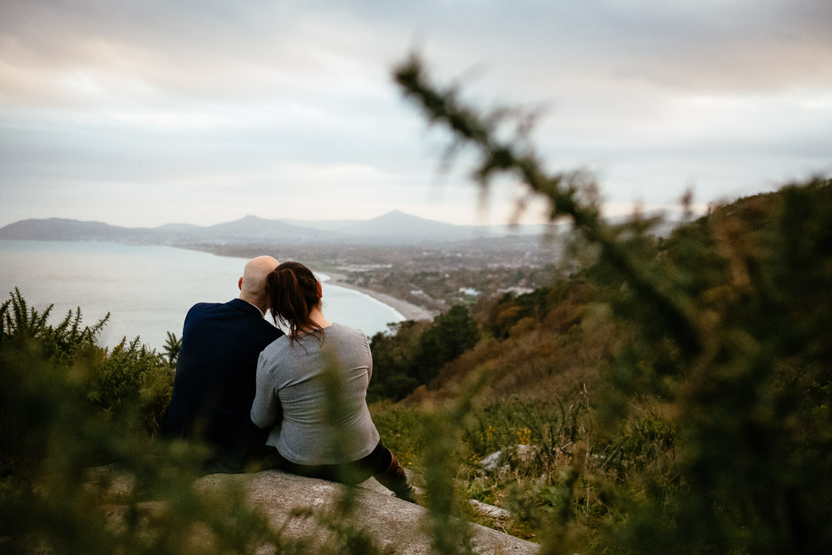 engaged couple sitting