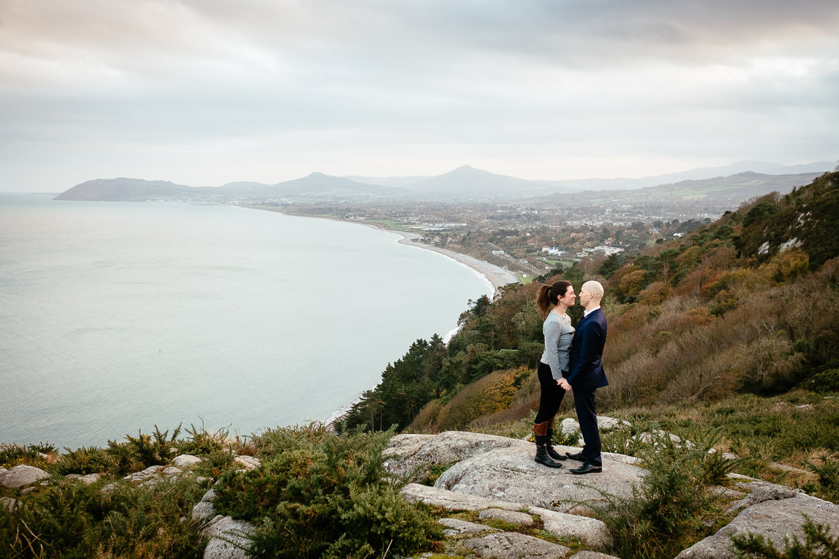 engaged couple overlooking dublin bay