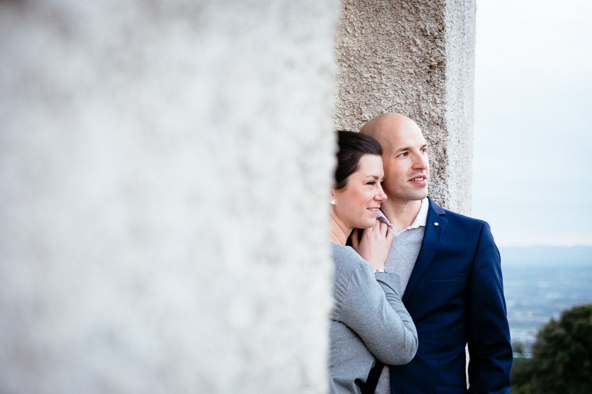 engaged couple embracing