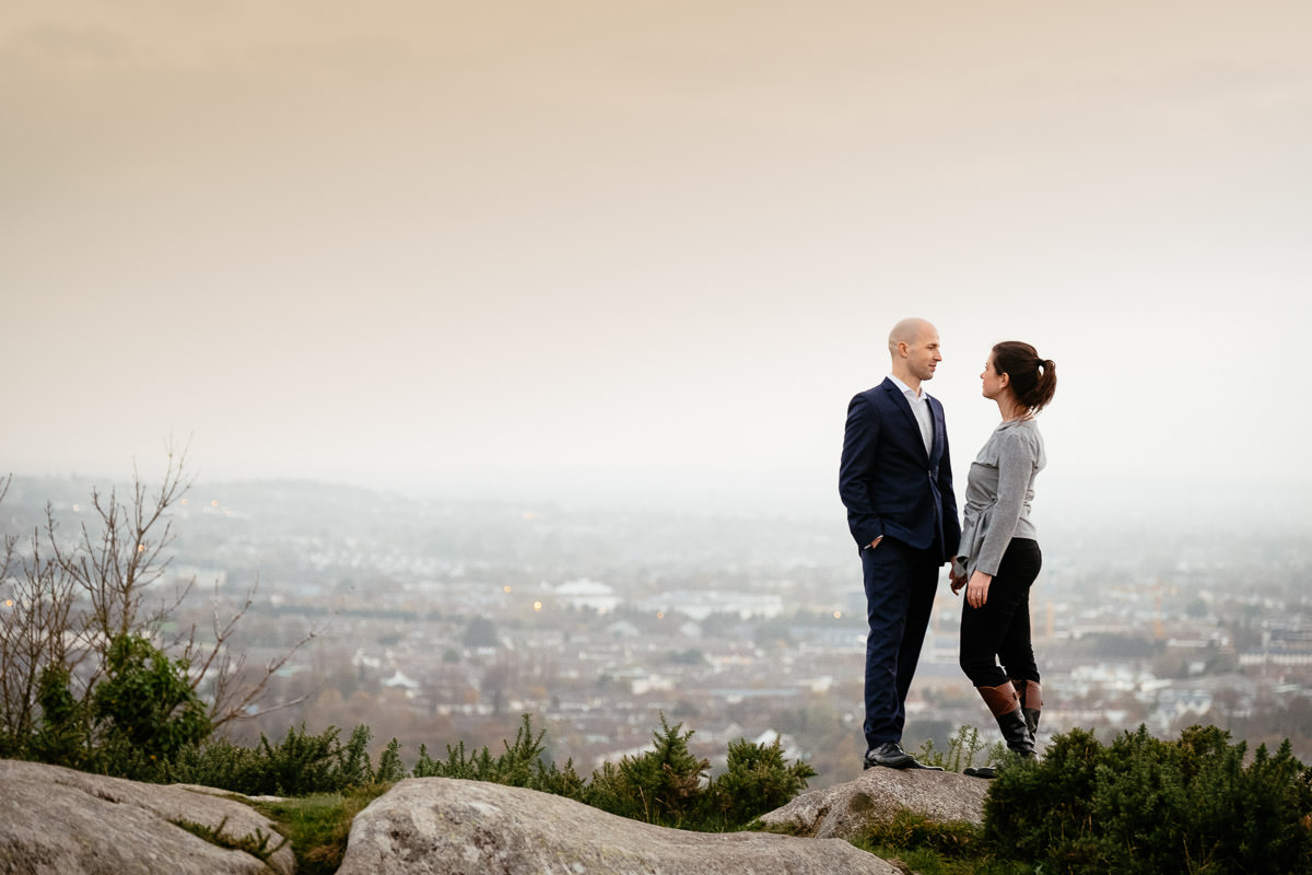 engaged couple with Dublin in the background