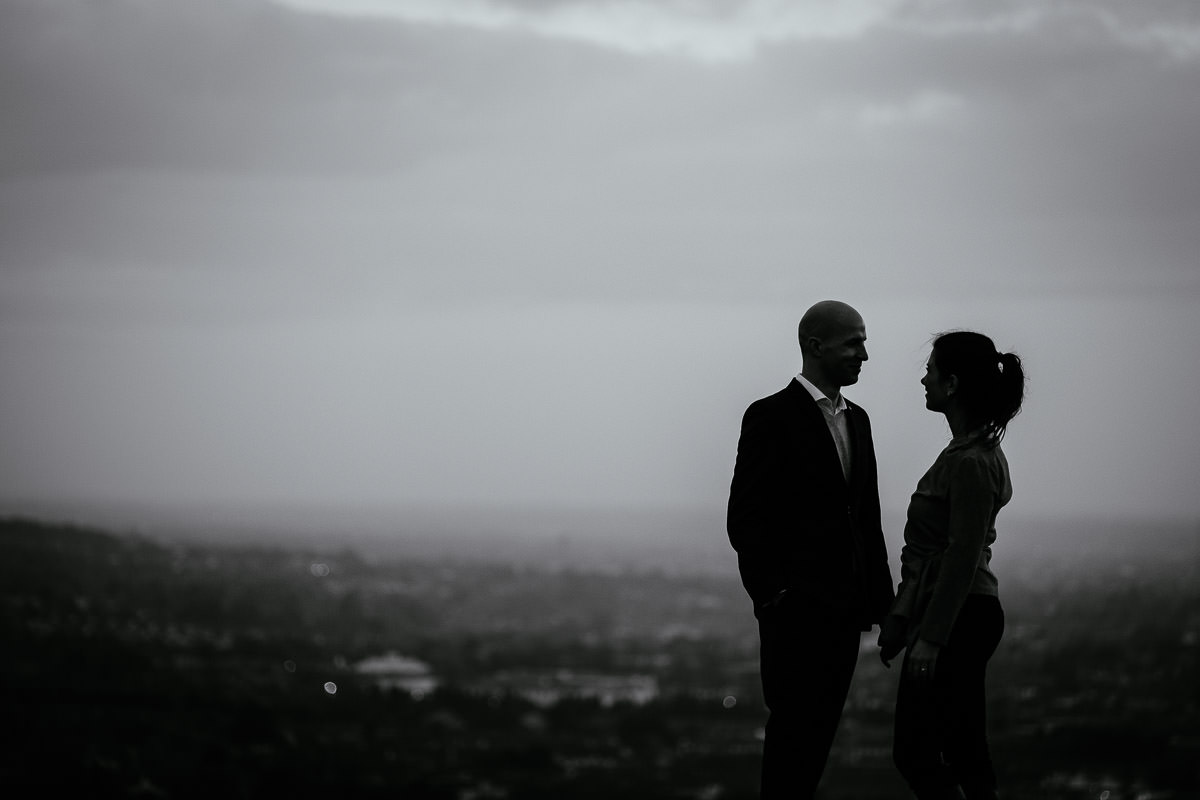 engaged couple with Dublin city in the background