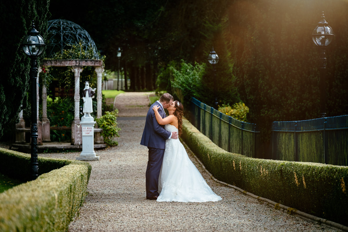 bride and groom embracing at the killashee hotel naas