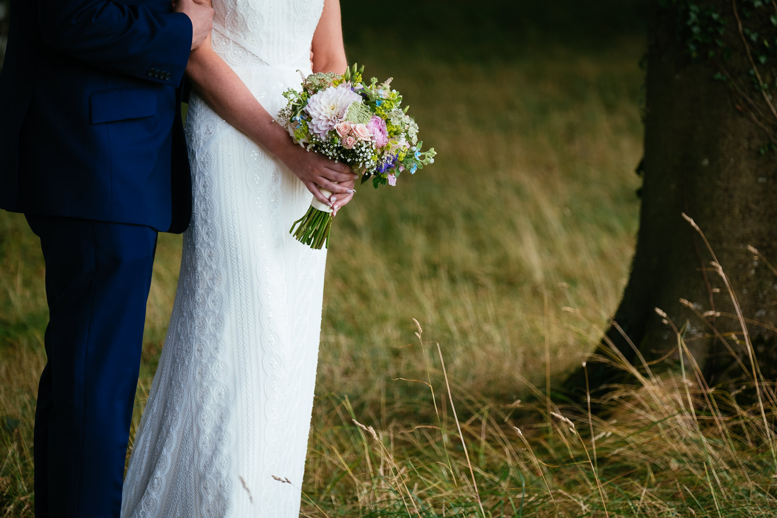 bride holding flowers