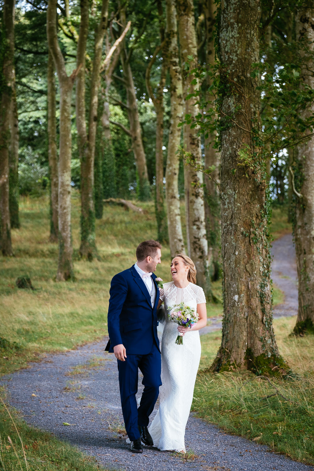 bride and groom laughing