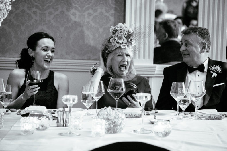 mother of the bride laughing during speeches