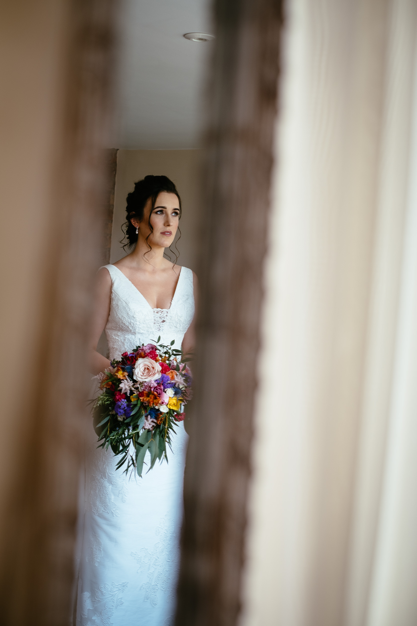 brides reflection in a mirrir at ballymagarvey village