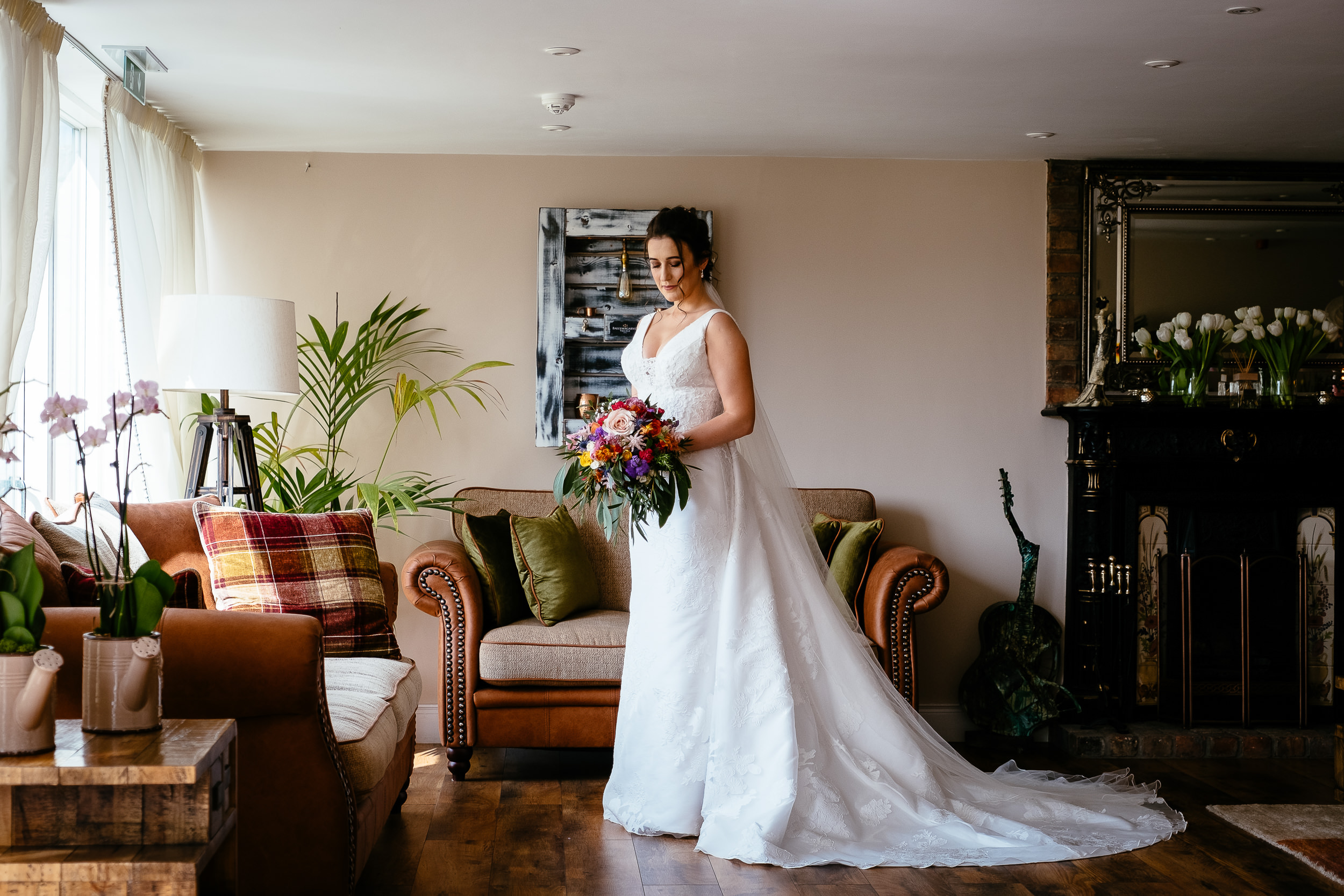 bride holding her flowers at ballymagarvey village