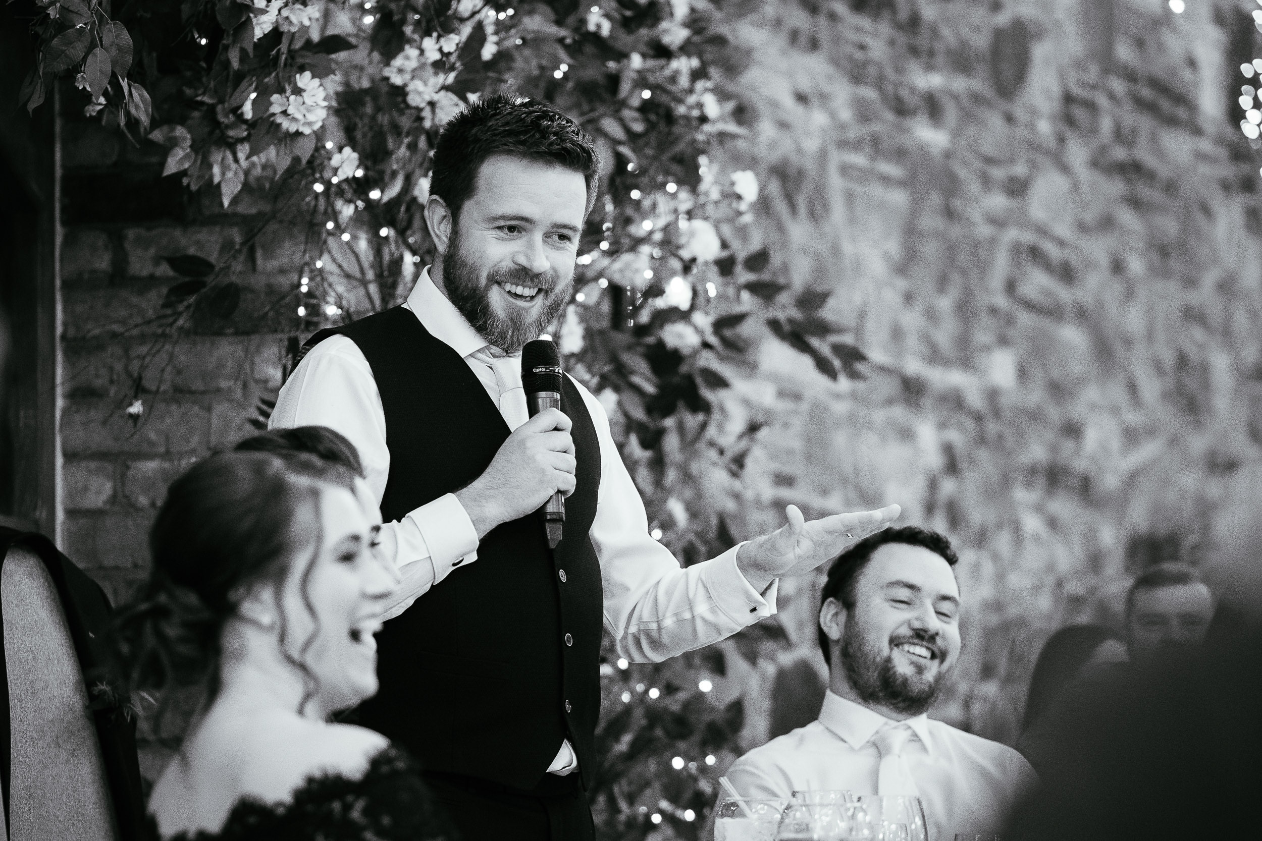 groom standing making a speech