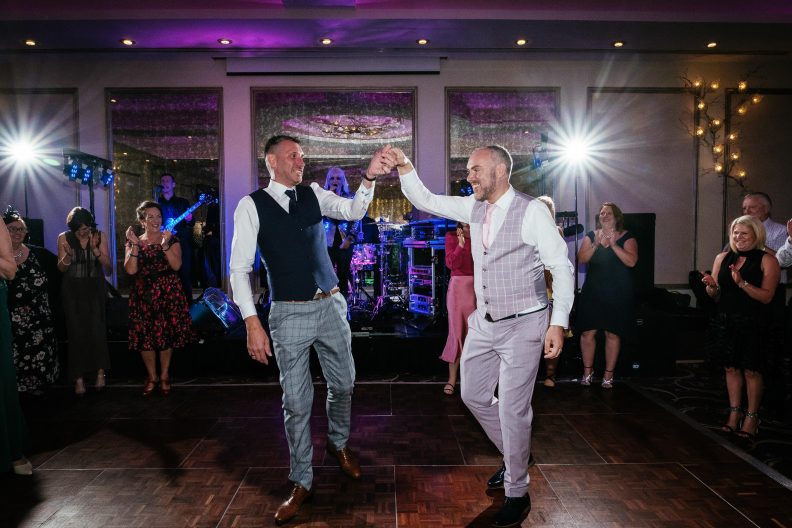 grooms dancing in dancefloor