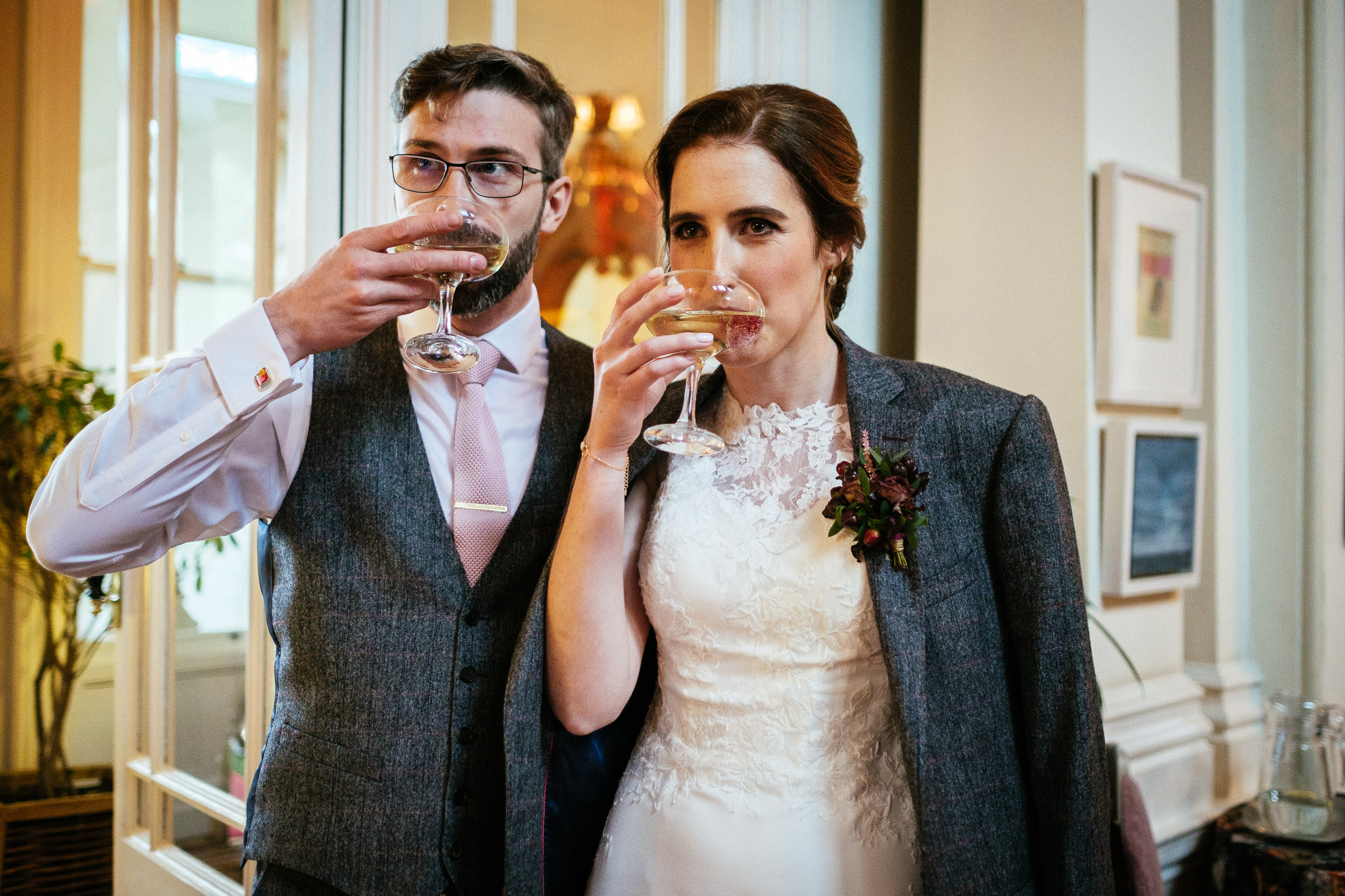 bride and groom drinking champagne at tinakilly house Wicklow