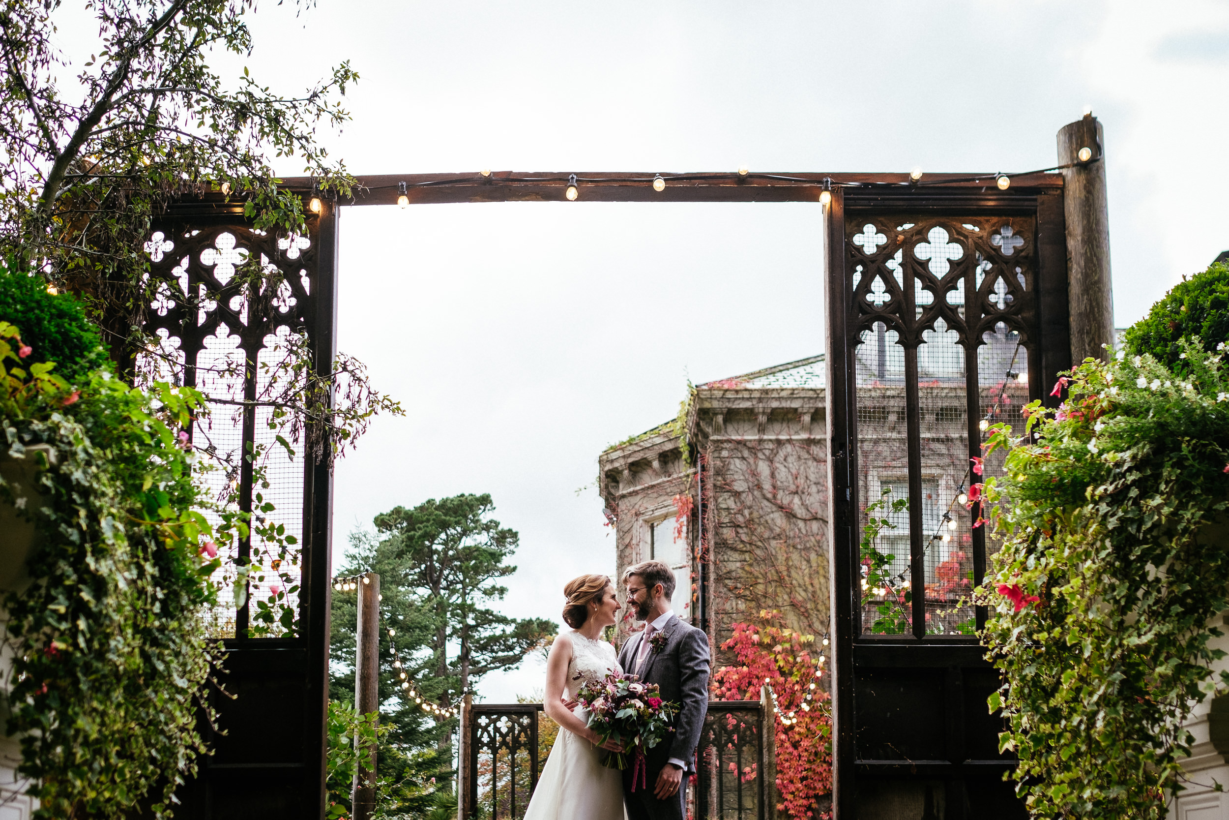 bride and groom talking at their tinakilly house wedding