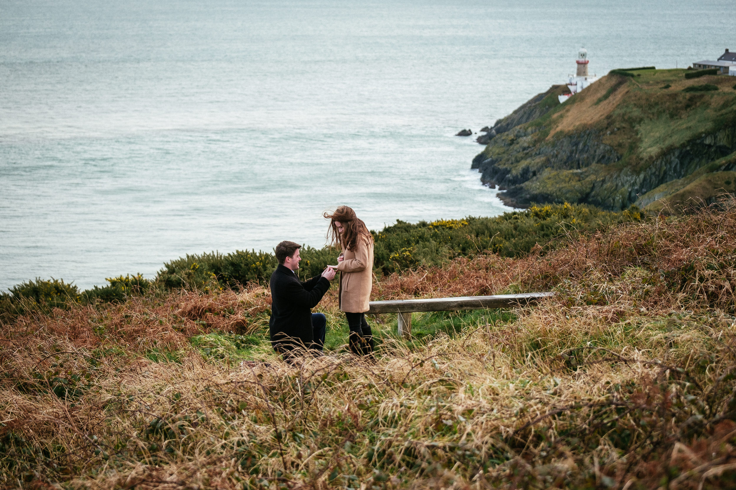 guy proposing to girlfriend at howth summit