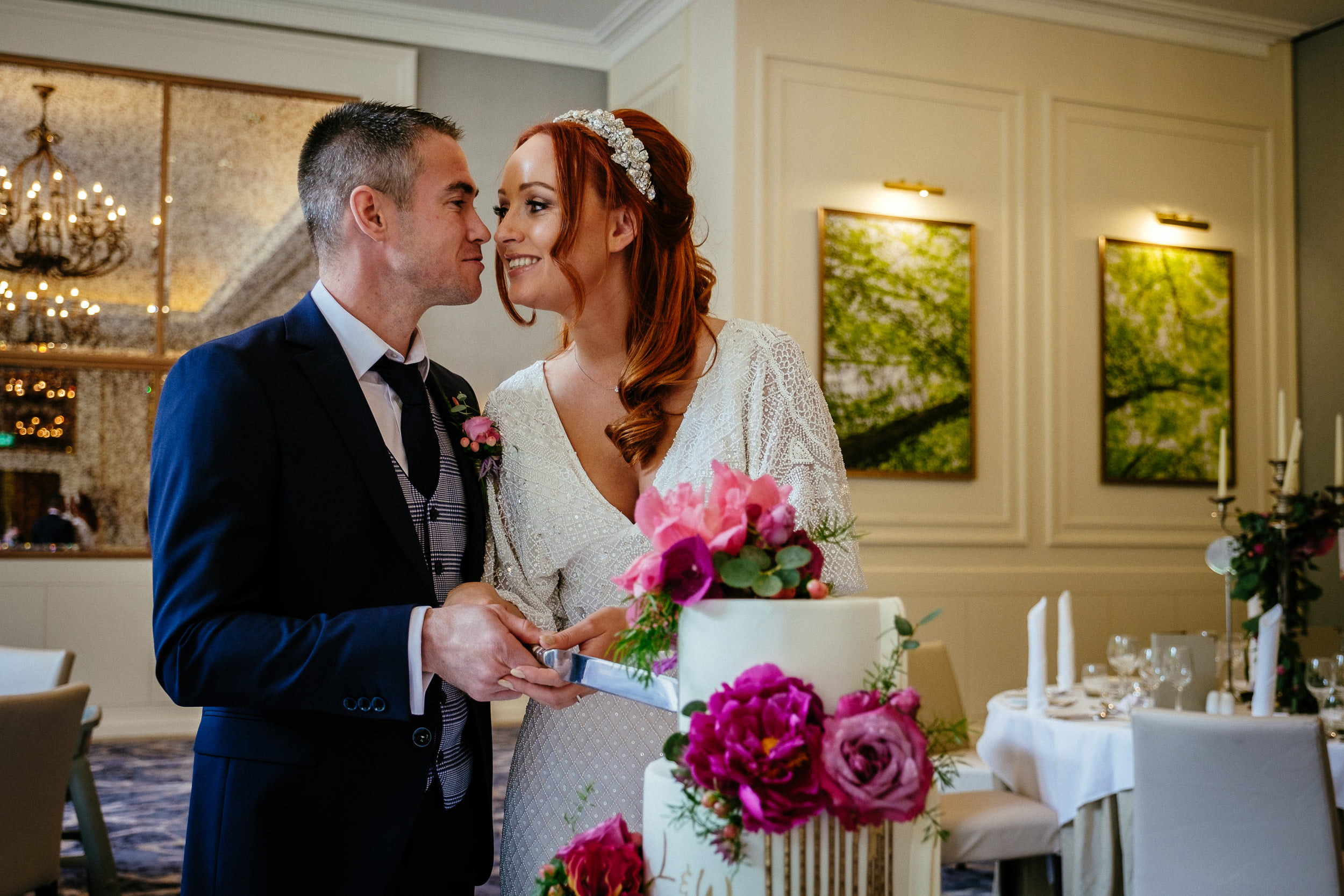 bride and groom cutting their cake at a Fota Island Resort Cork wedding