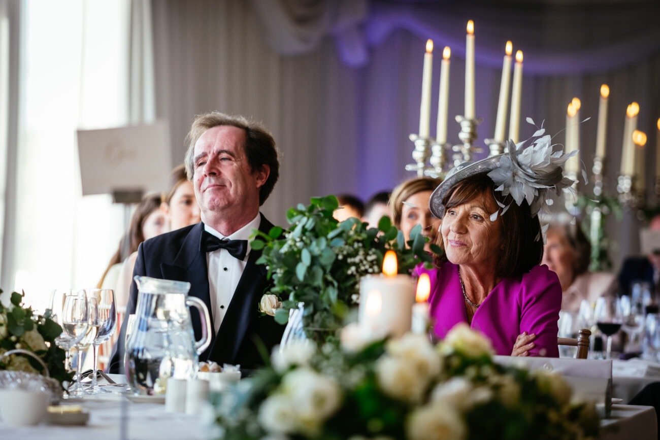 A man and woman enjoying a table at a wedding held at Trump International Hotel Doonbeg.