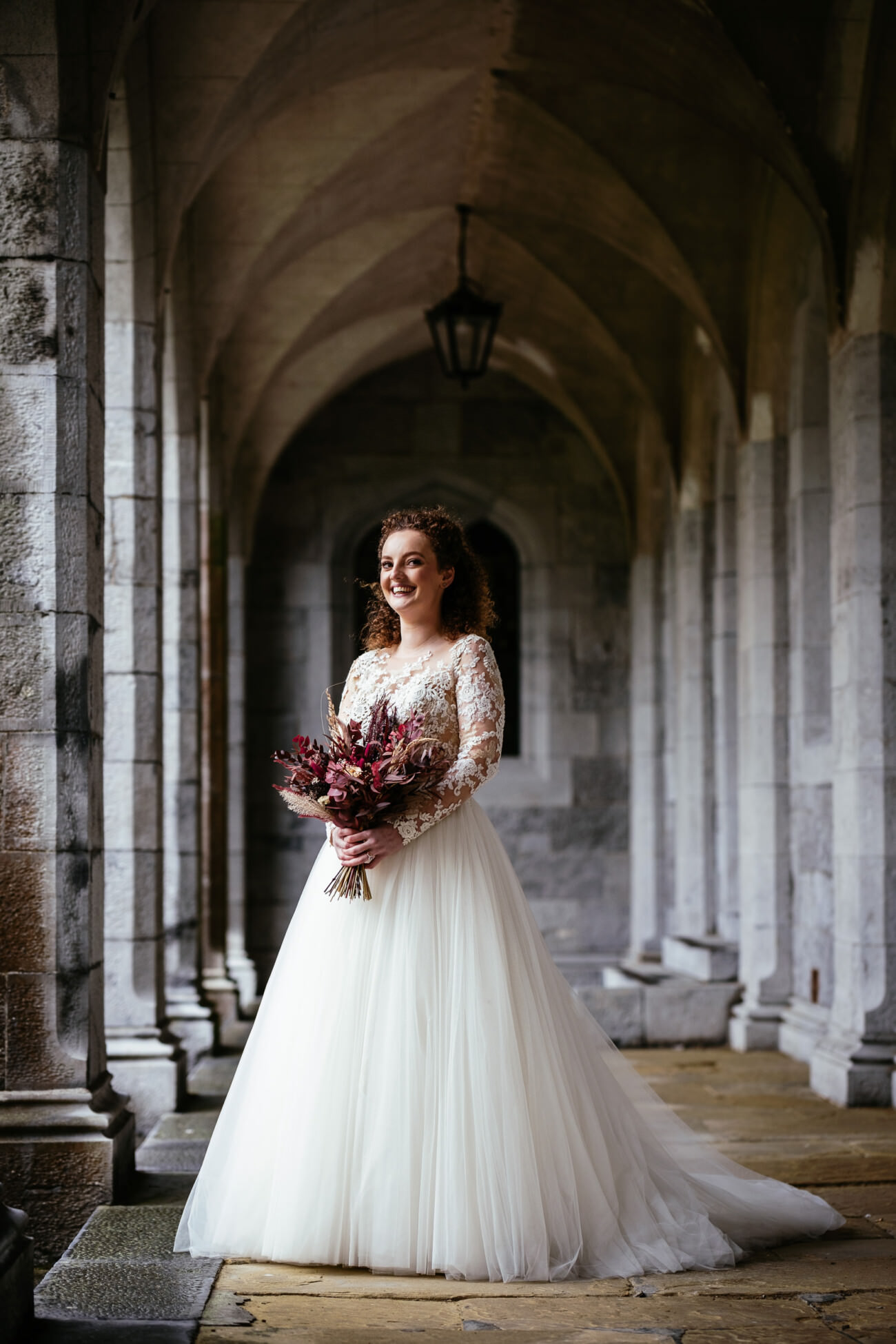 Christmas Wedding in UCG 78 bride posing for a photo in UCG