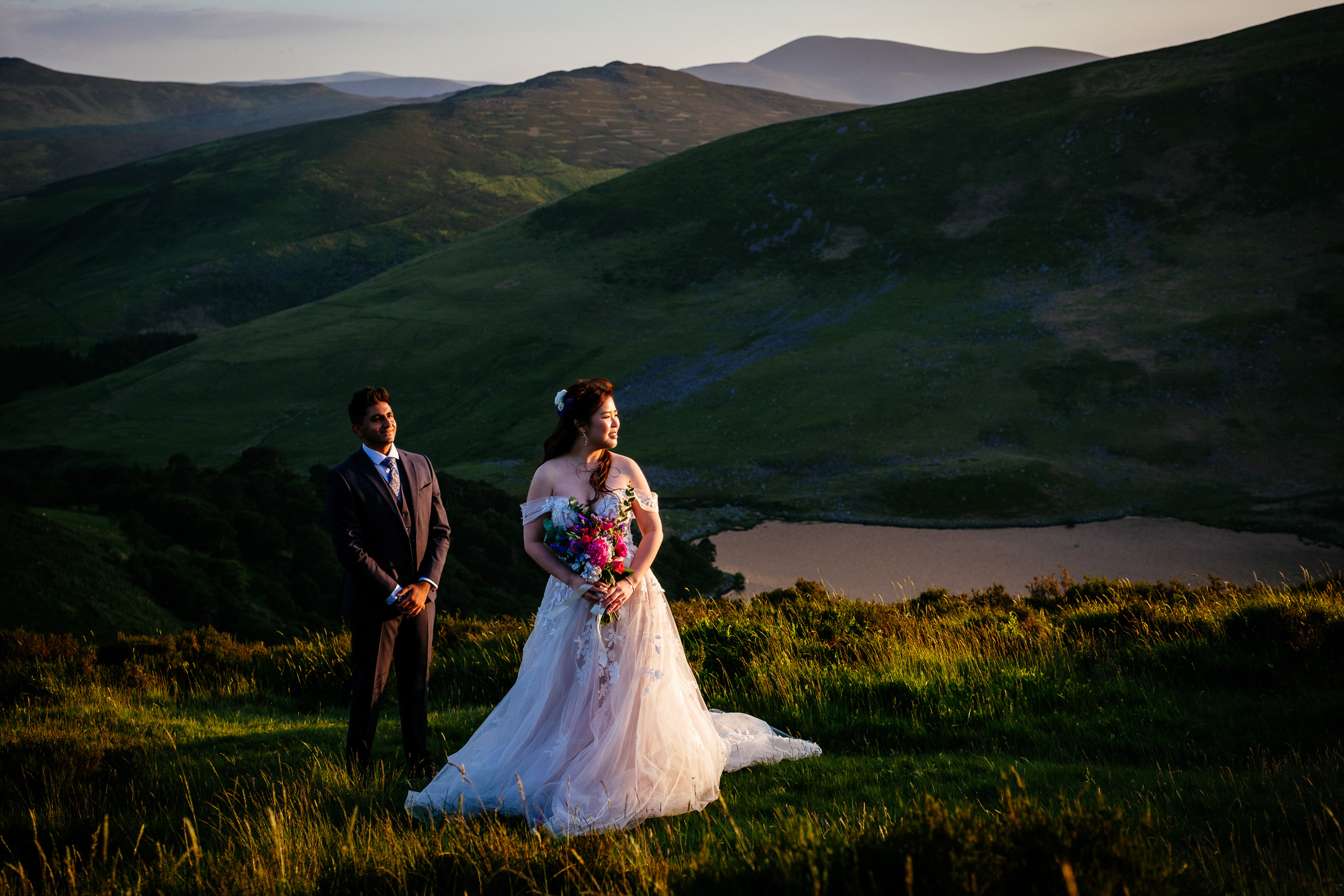 A couple at Lough Tay, the Guinness Lake, in the Wicklow mountains