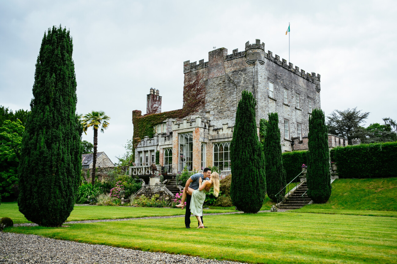 A couple in front of ivy-covered Huntington Castle, Co. Carlow