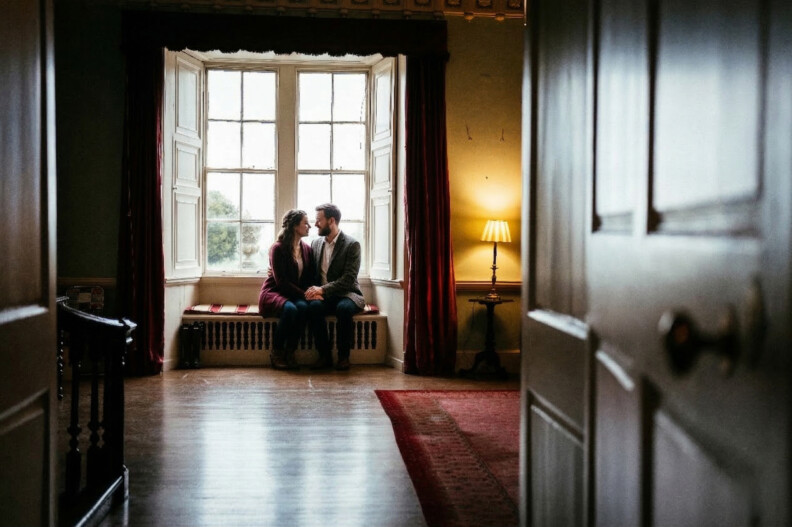 A couple on a window seat at Howth Castle