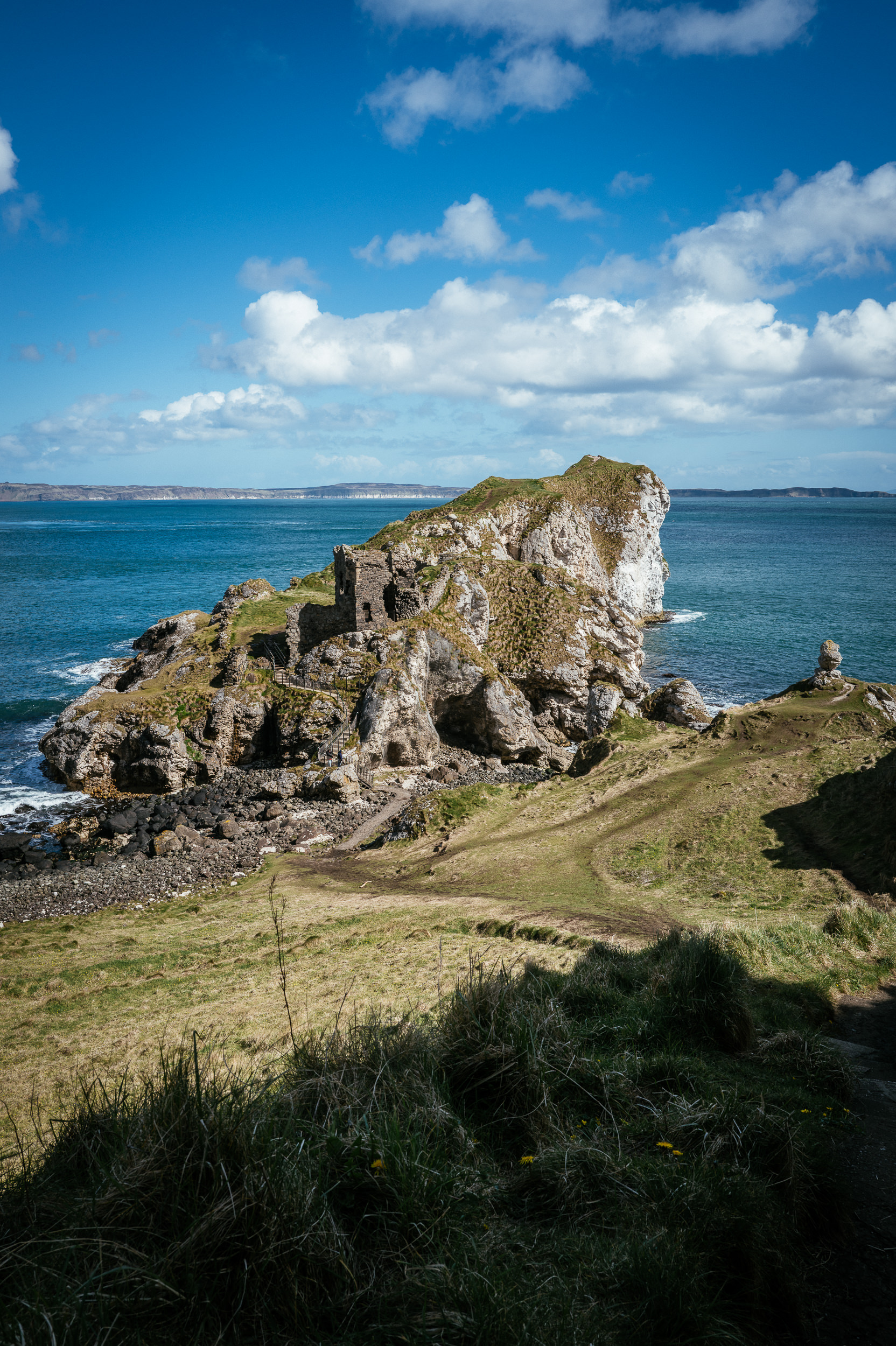 Kinbane Castle Elopements 2 The rocky headland and castle ruins at Kinbane Head, County Antrim, with the sea beyond